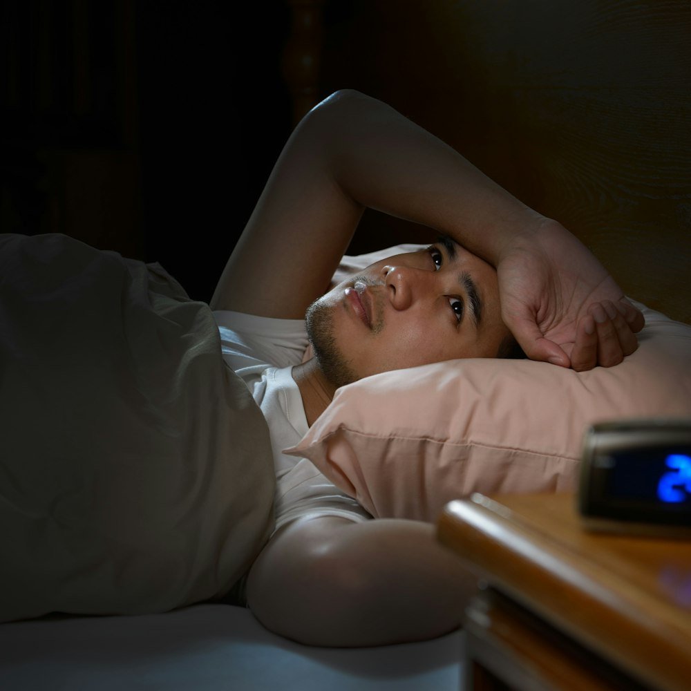 Man with sleep apnea having trouble sleeping